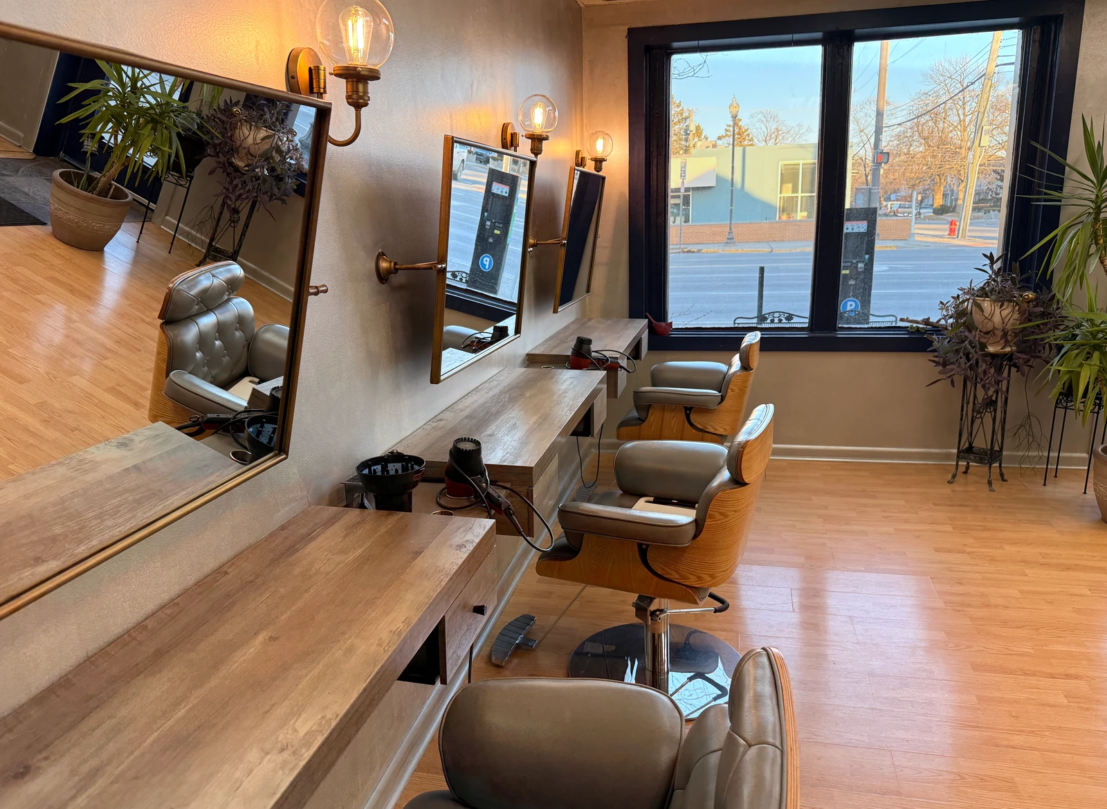 Styling chairs and mirrors inside Helena’s Hair Salon
