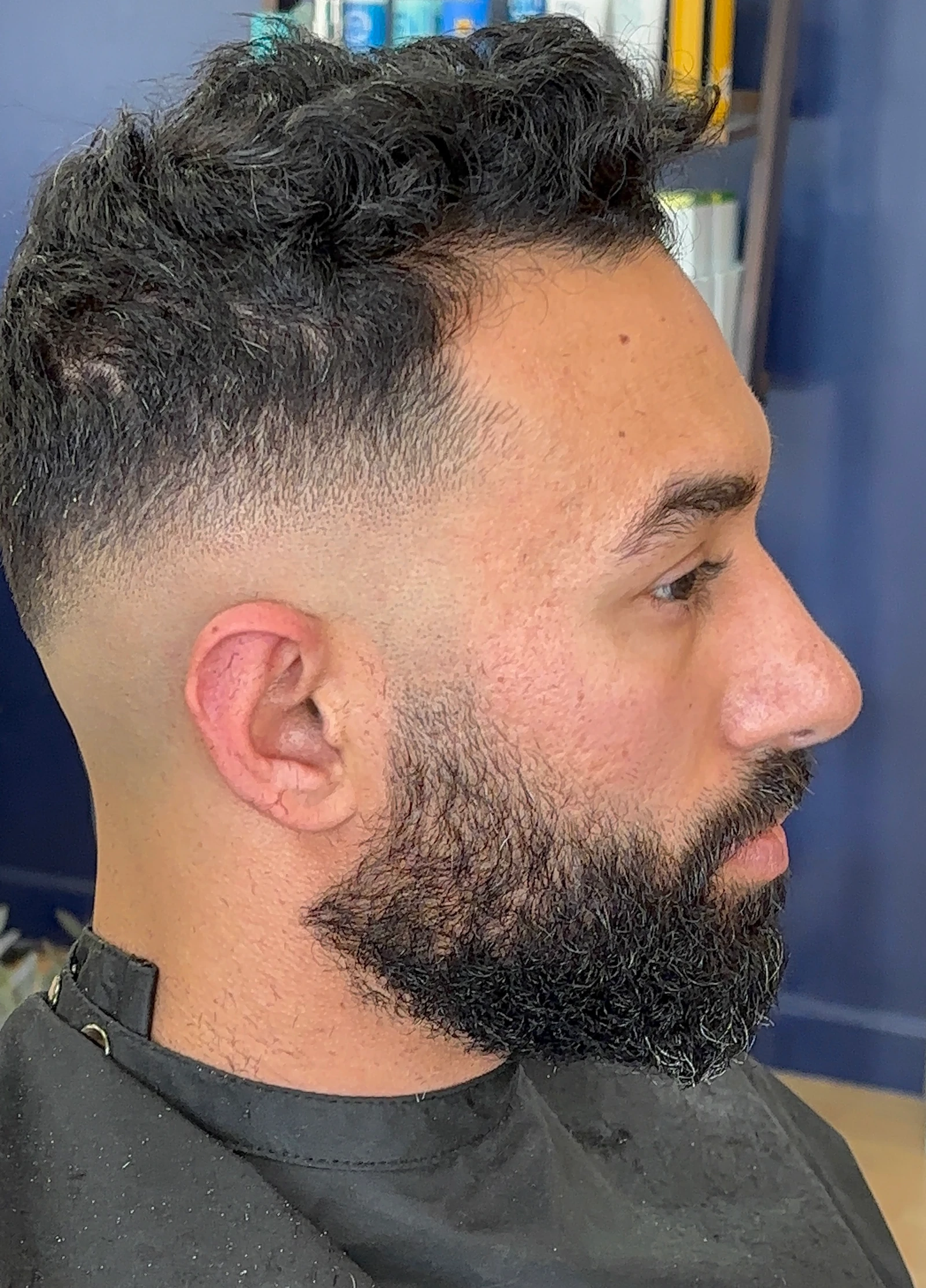 Bald fade haircut, side view; beard was not trimmed